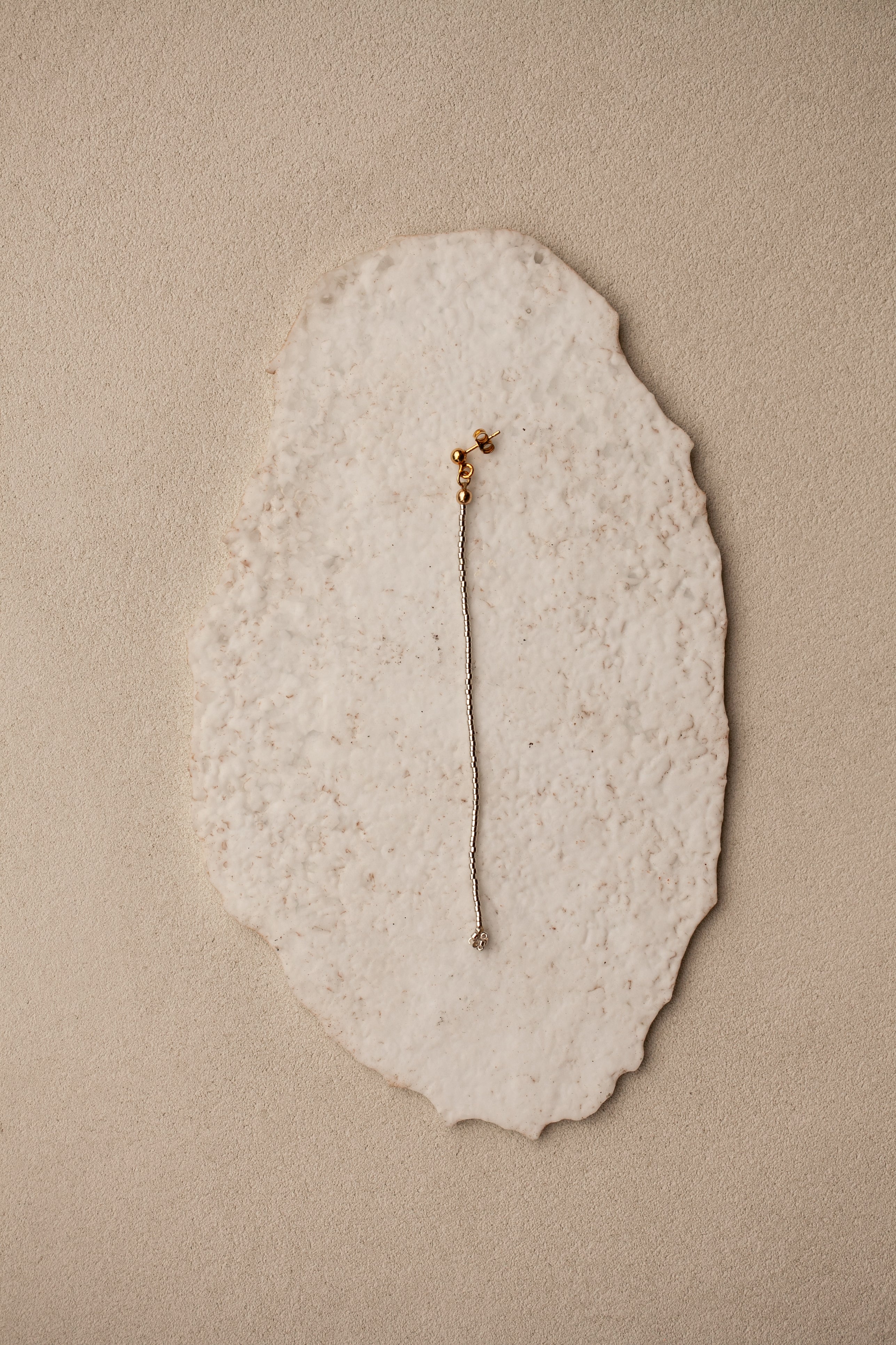 "Monorecchino Essenziale"