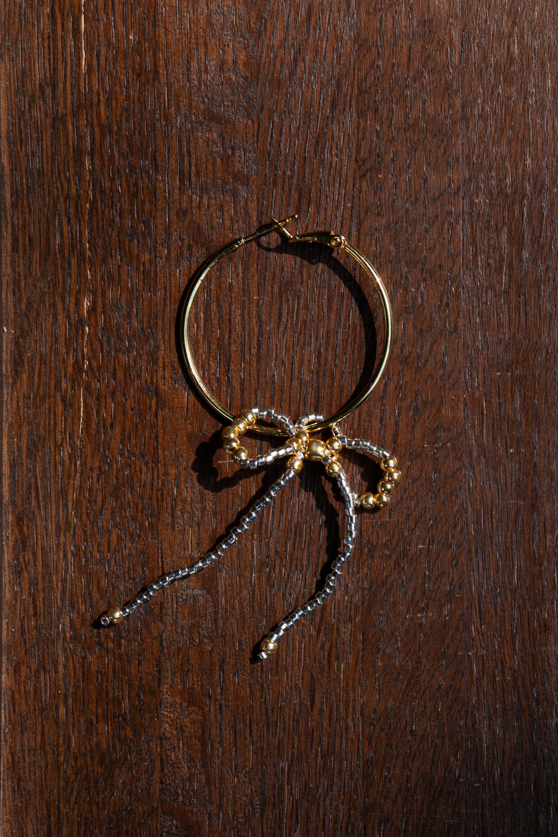 "Monorecchino Fioccone Gold e Silver"