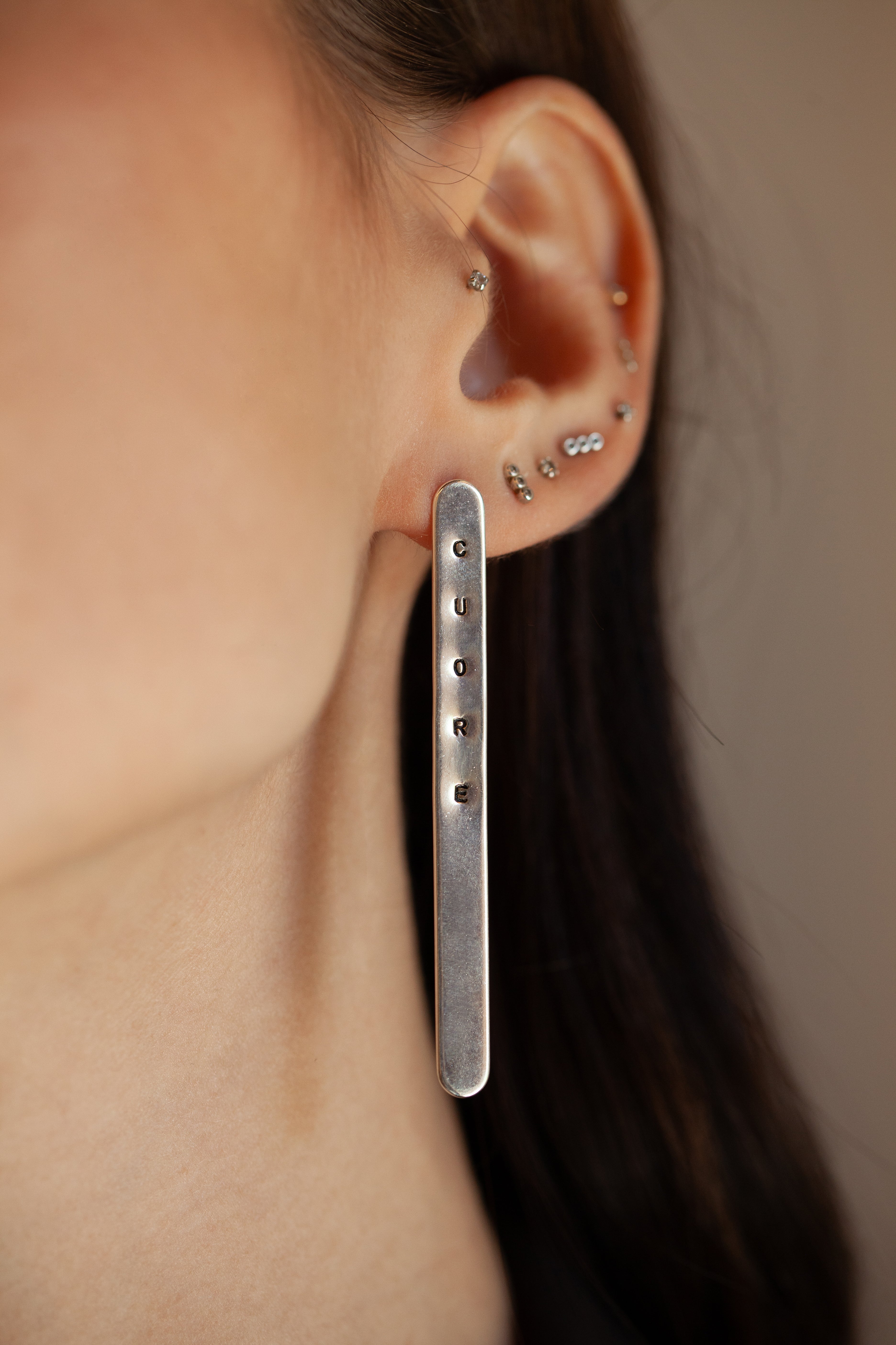 “Orecchini barretta”