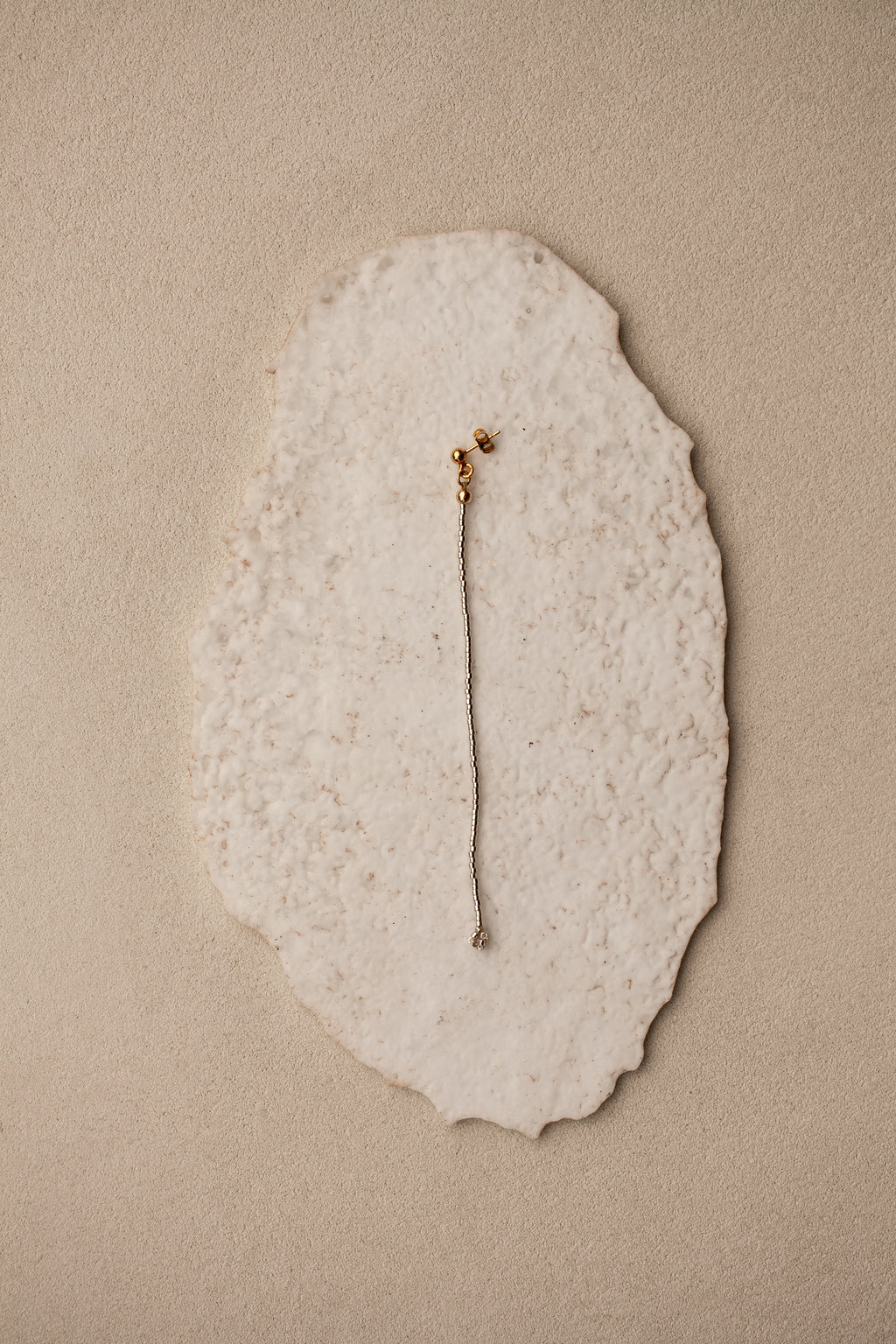 "Monorecchino Essenziale"