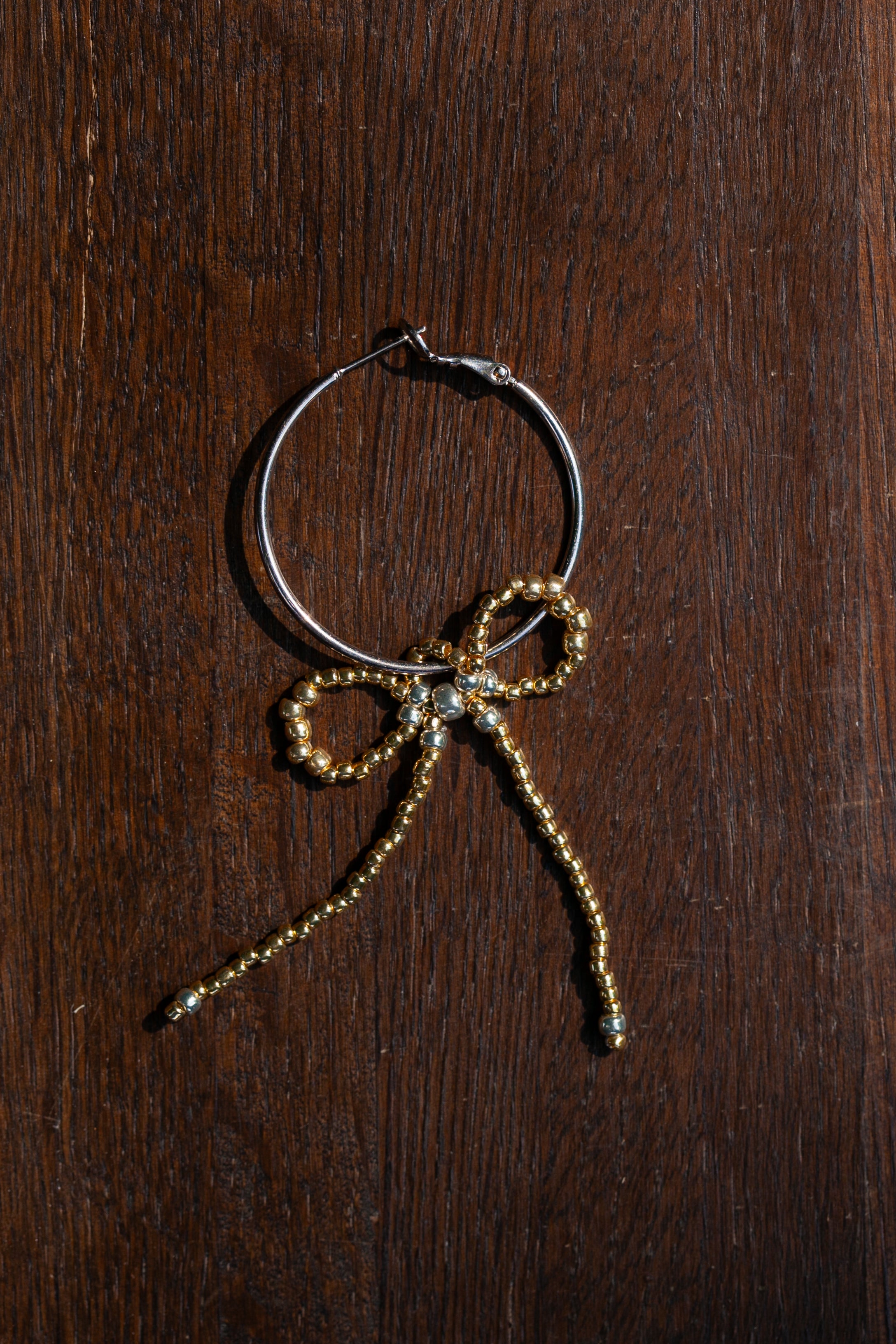 "Monorecchino Fioccone Gold e Silver"